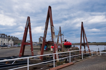 Fototapeta premium Irvine Harbour in Ayrshire Scotland looking Over some Old maratime Equiptment