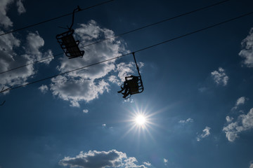 Cablecars with people against sunlight in Boppard