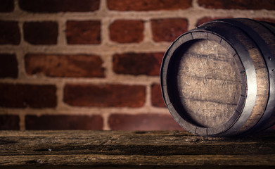 Wine beer cognac whiskey or rum barrel on wooden table