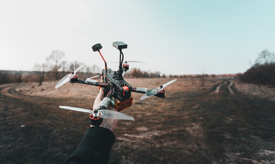Man holds in his hand fpv copter