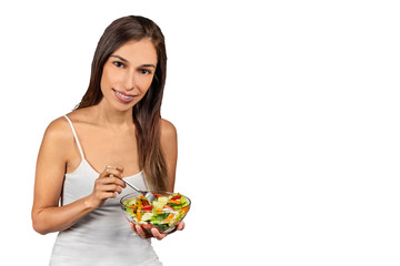 Relaxed woman eating a salad bowl, Healthy nutrition is a good diet routine