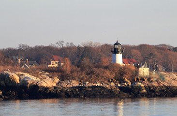Ten Pound Island Lighthouse on Ten Pound Island, Gloucester, Massachusetts, at sunset