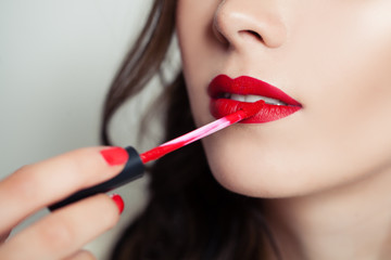 Perfect female lips and lipstick closeup