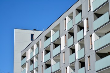 Modern apartment buildings on a sunny day with a blue sky. Facade of a modern apartment building