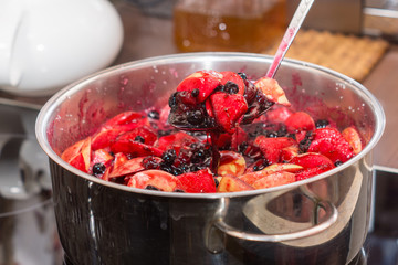 Process of cooking jam. Close up