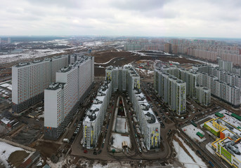 Obraz premium new high-rise residential buildings in the new neighborhood of Moscow. Aerial view City of Lyubertsy, Moscow Region, Russia.