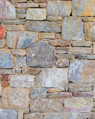 colorful stonewall close up, seamless natural background