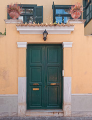colorful house fornt entrance at Plaka picturesque neighbohood,  Athens Greece