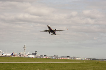Airplane takes off at Schiphol Netherlands