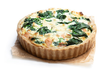 Raw salmon quiche wich broccoli and spinach isolated on white