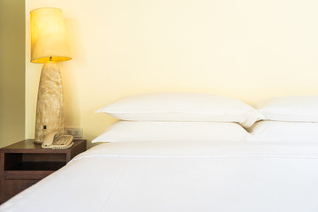 Beautiful comfortable pillow on bed decoration in bedroom