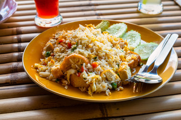 Authentic cuisine pad thai with rice smoked tofu bean sprouts peanuts and lime garnish