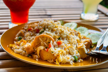 Authentic cuisine pad thai with rice smoked tofu bean sprouts peanuts and lime garnish