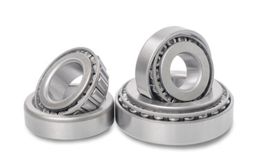 Three tapered roller bearings isoleted on white background.