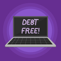 Conceptual hand writing showing Debt Free. Concept meaning does not owning any money or things to any individual or companies Laptop with Grid Design Keyboard Screen on Pastel Backdrop