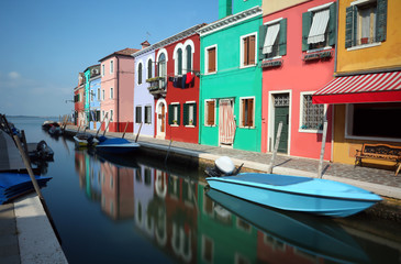 Fototapeta na wymiar Colourfully painted houses on Burano Island near Venice in Italy