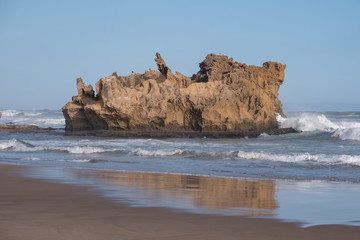 Rock on the beach at Brenton on Sea, photographed at dusk. Knysna, South Africa.