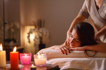 Obraz na płótnie Canvas Girl on massage in the spa salon.