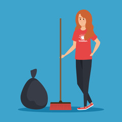 girl volunteer with broom and trash bag
