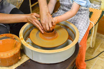 The process of making pottery on the Potter's wheel