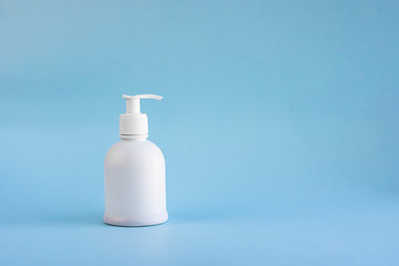 white plastic mockup bottle dispenser on light blue empty background with copy space