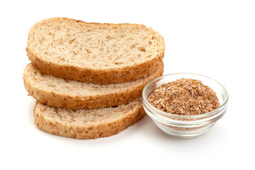 Slices of wheat bread and bran, healthy organic food, fitness, close-up, isolated on white background