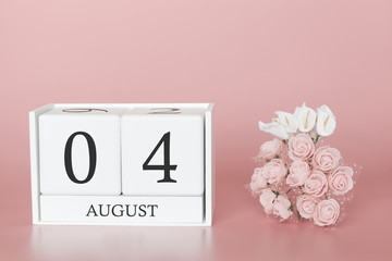 August 04th. Day 4 of month. Calendar cube on modern pink background, concept of bussines and an importent event.