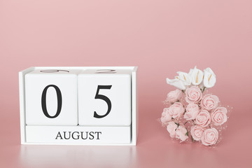 August 05th. Day 5 of month. Calendar cube on modern pink background, concept of bussines and an importent event.