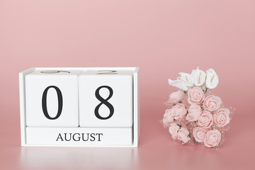 August 08th. Day 8 of month. Calendar cube on modern pink background, concept of bussines and an importent event.