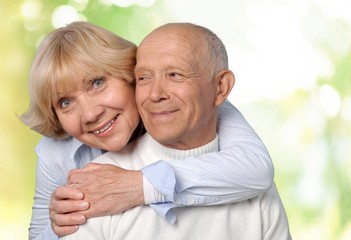 Portrait of happy senior couple smiling