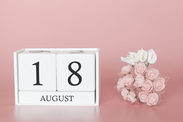 August 18th. Day 18 of month. Calendar cube on modern pink background, concept of bussines and an importent event.