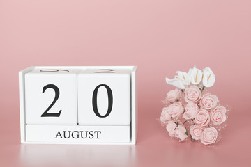August 20th. Day 20 of month. Calendar cube on modern pink background, concept of bussines and an importent event.