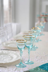 Seashell plate with pearl  and blue glasses
