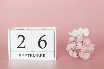 September 26th. Day 26 of month. Calendar cube on modern pink background, concept of bussines and an importent event.