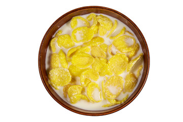 Cornflakes with milk in a bowl isolated on white background
