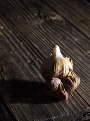 garlic on old wooden table