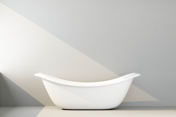 white modern bath against white wall