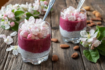 Chia pudding with almond milk and apple blossoms