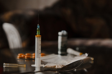 heroin syringe. addiction from drugs