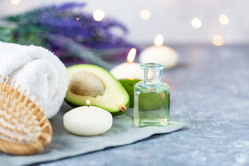 Obraz na płótnie Canvas Spa, beauty treatment and wellness background Towel Cosmetic Massage oil, flowers, lights and candel