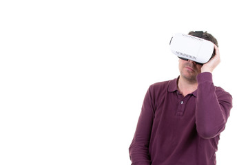 Young man with vr virtual reality goggles helmet headset on white background copy space