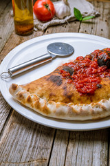 Closed calzone pizza