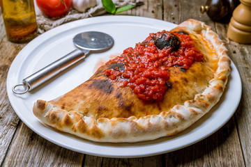 Closed calzone pizza