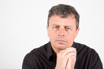 Serious businessman portrait successful middle aged manager business man standing in isolated white background