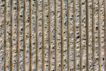 Beige concrete wall pattern vertical lines and stripes. Design concept.