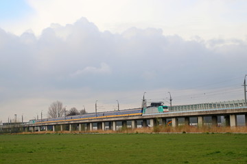 Fototapeta na wymiar Intercity Direct between amsterdam and Rotterdam at bleiswijk viaduct