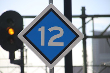 Stop signal at a platform of a trainstation in the netherlands determing in the number of wagons