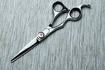 Stylish Professional Barber Scissors; Hairdresser salon concept;Haircut accessories.