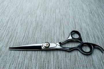 Stylish Professional Barber Scissors; Hairdresser salon concept;Haircut accessories.