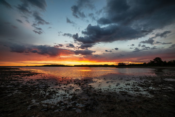 dark red sunset over sea in evening